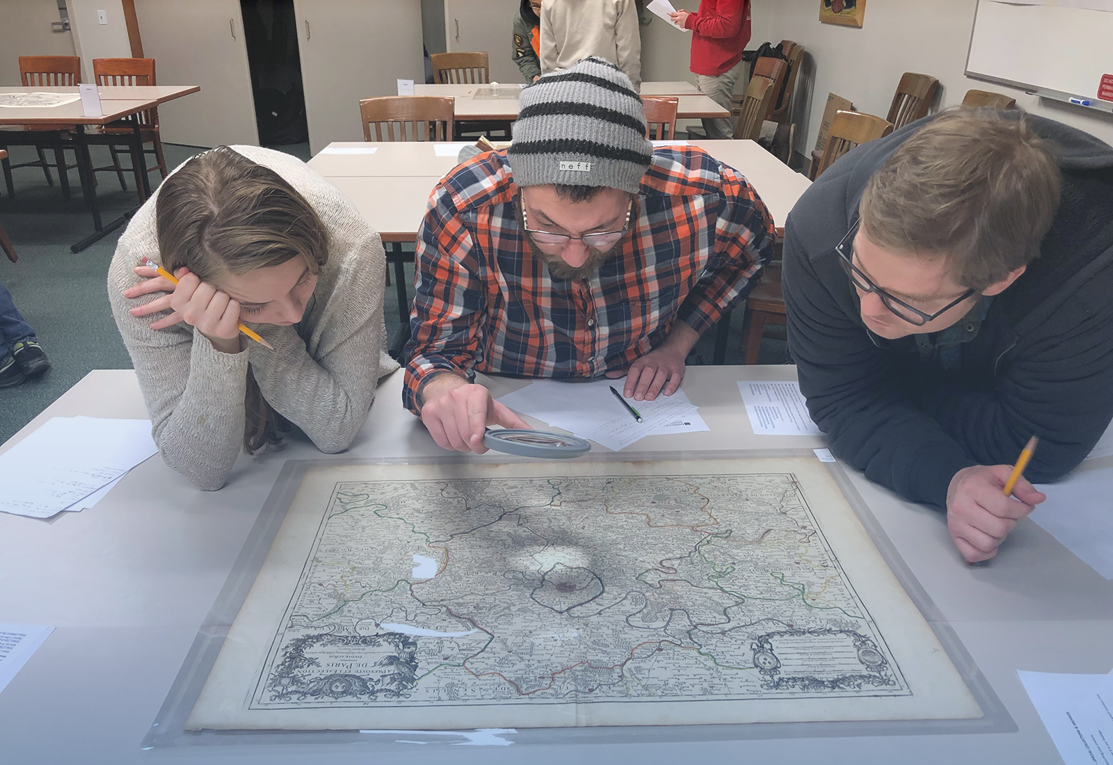 students looking at a map