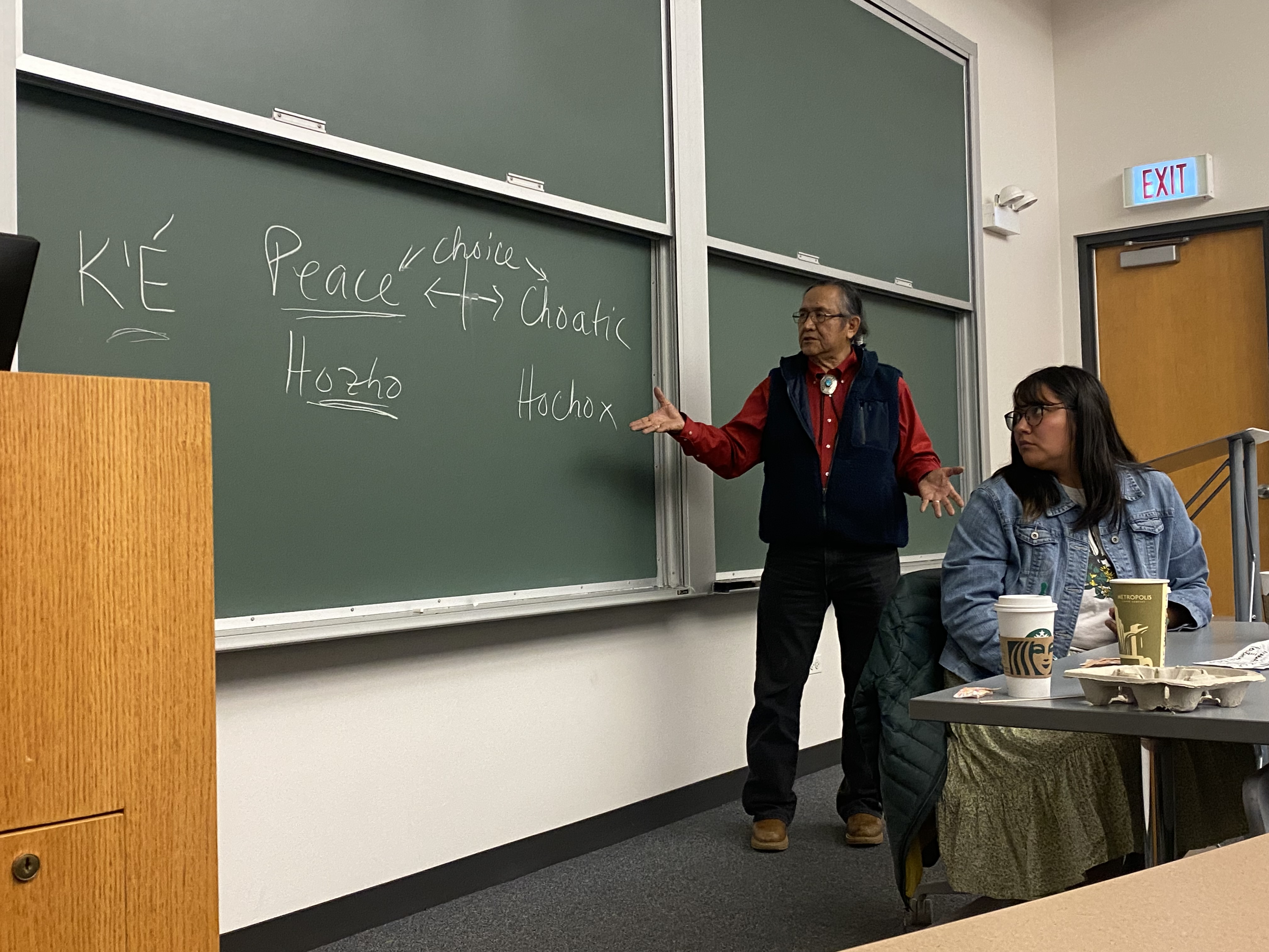 Robert Yazzie and Shandiin Yazzie giving a talk about indigenous perspectives on justice.