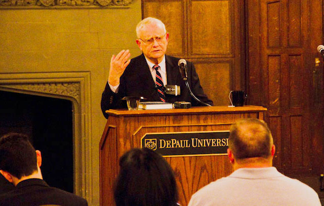 David L. Holmes at podium