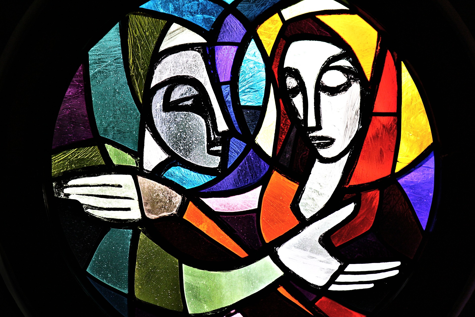 Stained glass image of Elizabeth greeting Mary Stained glass image of Elizabeth greeting Mary
